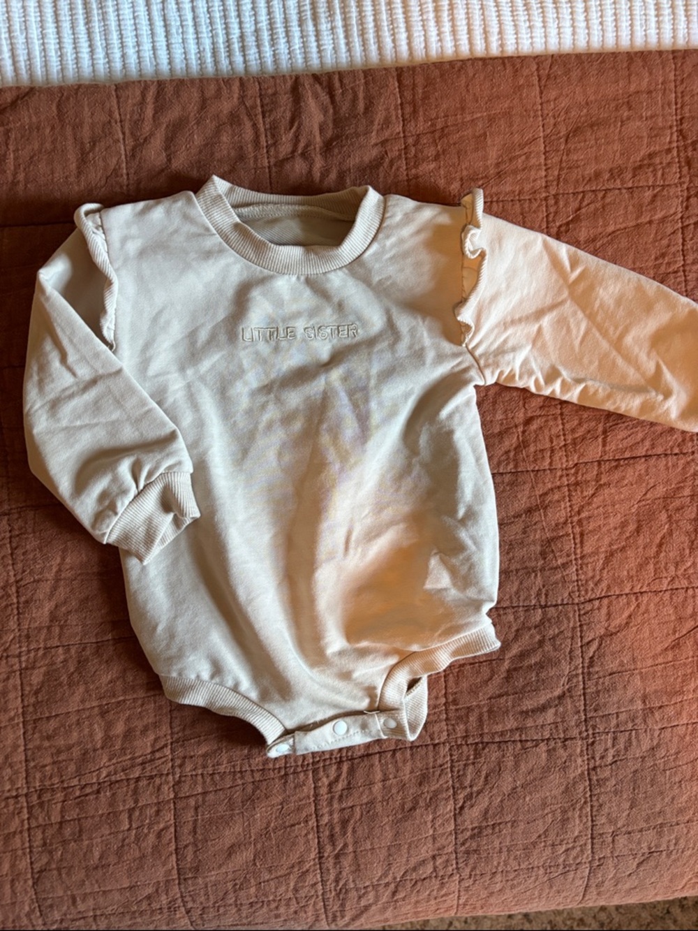 Cream Long-Sleeve Baby Bodysuit with Subtle Logo